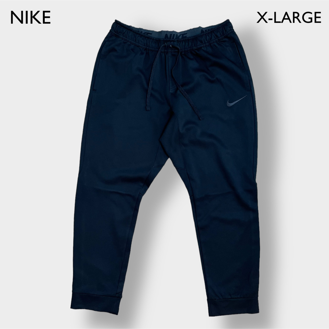 NIKE(ナイキ)のNIKE トラックパンツ ジャージ 刺繍 スウッシュ XL ビッグサイズ 古着 メンズのパンツ(その他)の商品写真