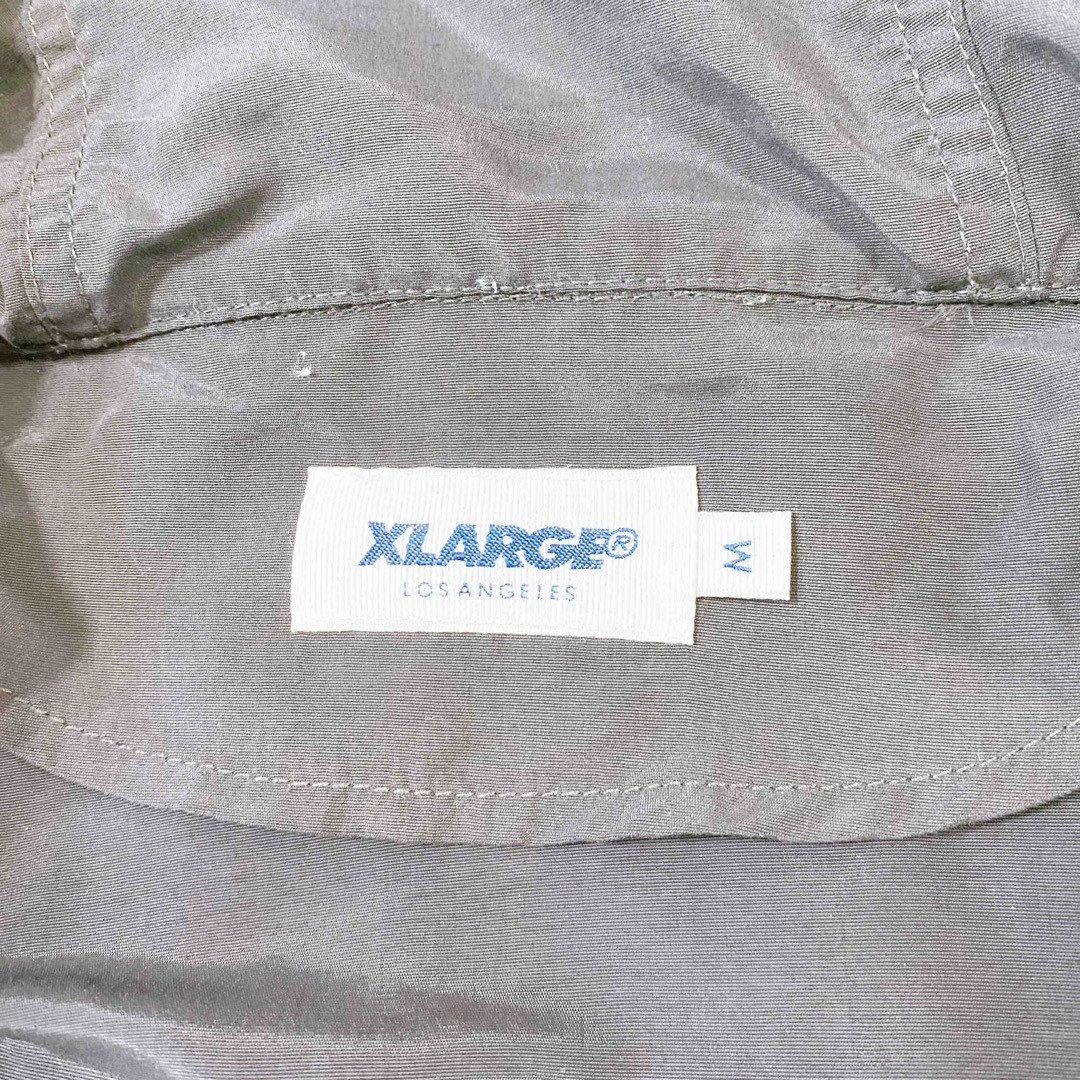 XLARGE(エクストララージ)のXLARGE エクストララージ　ナイロン　ジャンパー　フルジップ　ダークグレー メンズのジャケット/アウター(ナイロンジャケット)の商品写真