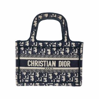 クリスチャンディオール(Christian Dior)の　クリスチャン・ディオール Christian Dior ブックトート ミニ S5475ZRIW_928 ベージュ×ネイビー キャンバス レディース トートバッグ(トートバッグ)