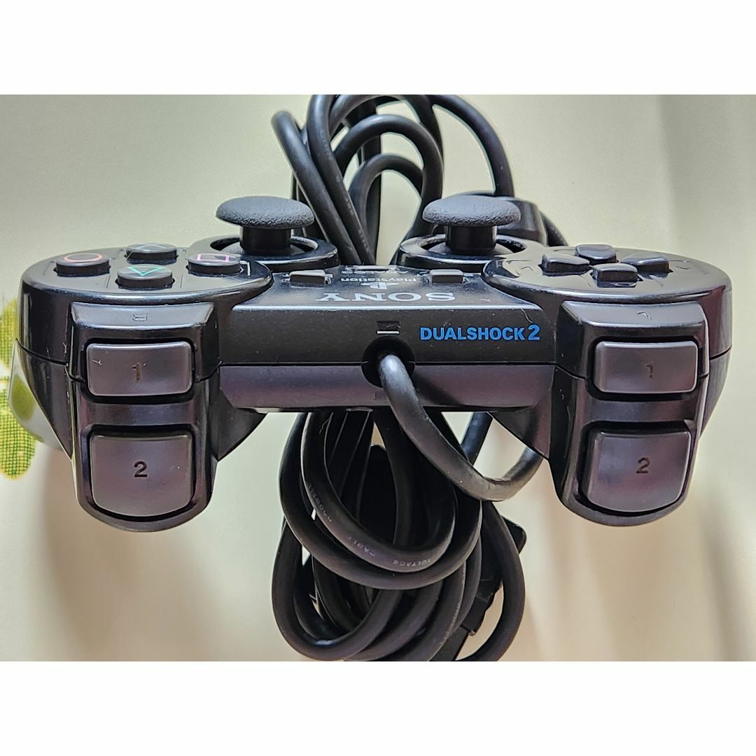 PlayStation2(プレイステーション2)のPS2コントローラー 純正品 ブラック　２個セット エンタメ/ホビーのゲームソフト/ゲーム機本体(家庭用ゲーム機本体)の商品写真