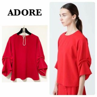 アドーア(ADORE)の極美品♡ アドーア クロスジャージーカットソー レッド サイズ38 七分袖(カットソー(長袖/七分))