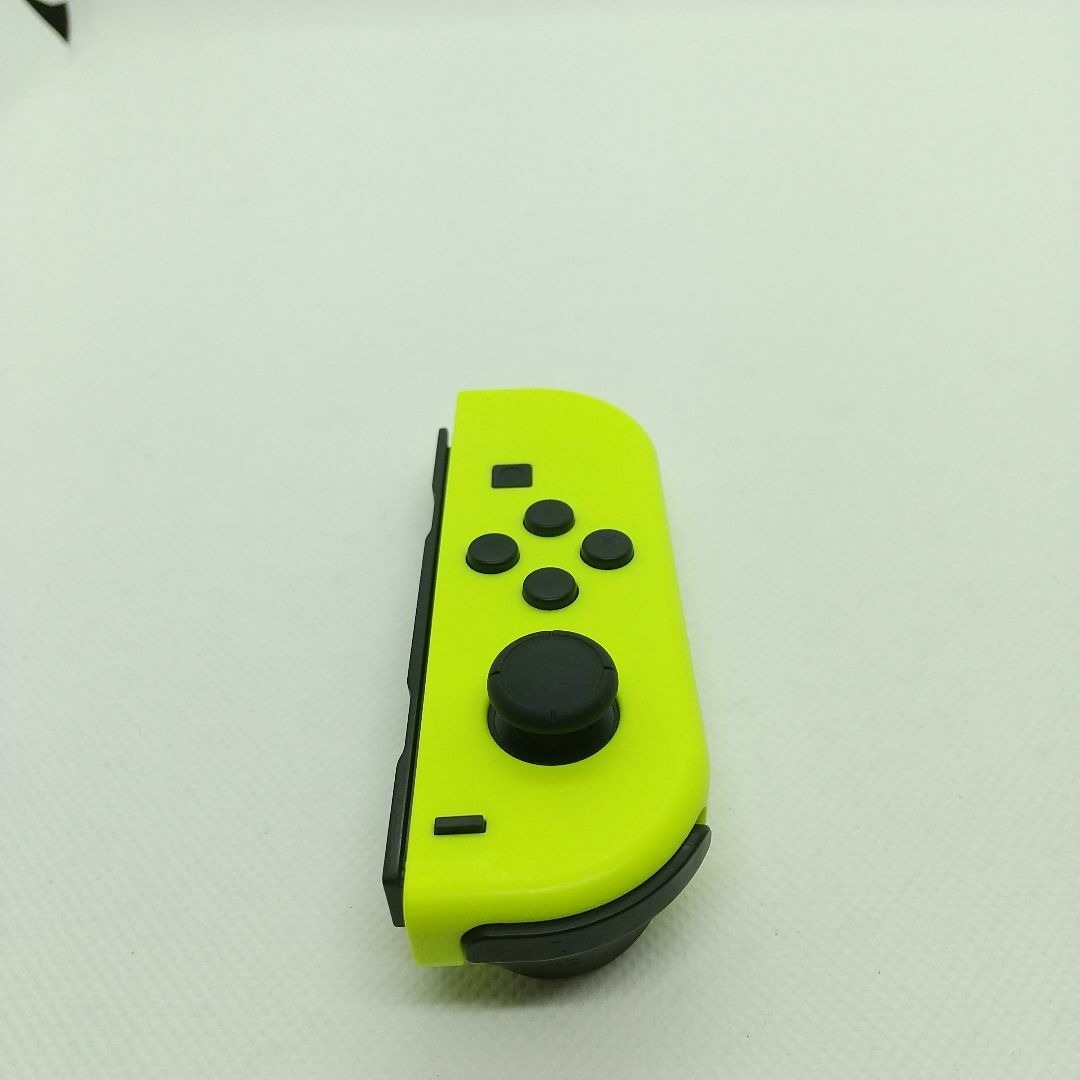 Nintendo Switch(ニンテンドースイッチ)の【希少】②Switch ジョイコン　ネオンイエロー左のみ(L)【任天堂純正品】黄 エンタメ/ホビーのゲームソフト/ゲーム機本体(家庭用ゲーム機本体)の商品写真