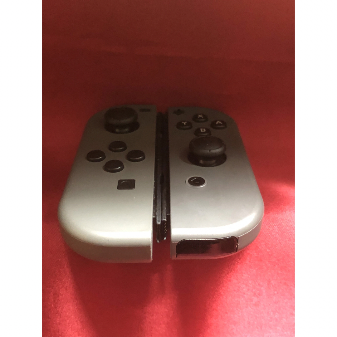 Nintendo Switch(ニンテンドースイッチ)の[安心保証]美品　純正ジョイコン　グレー　左右セット エンタメ/ホビーのゲームソフト/ゲーム機本体(その他)の商品写真