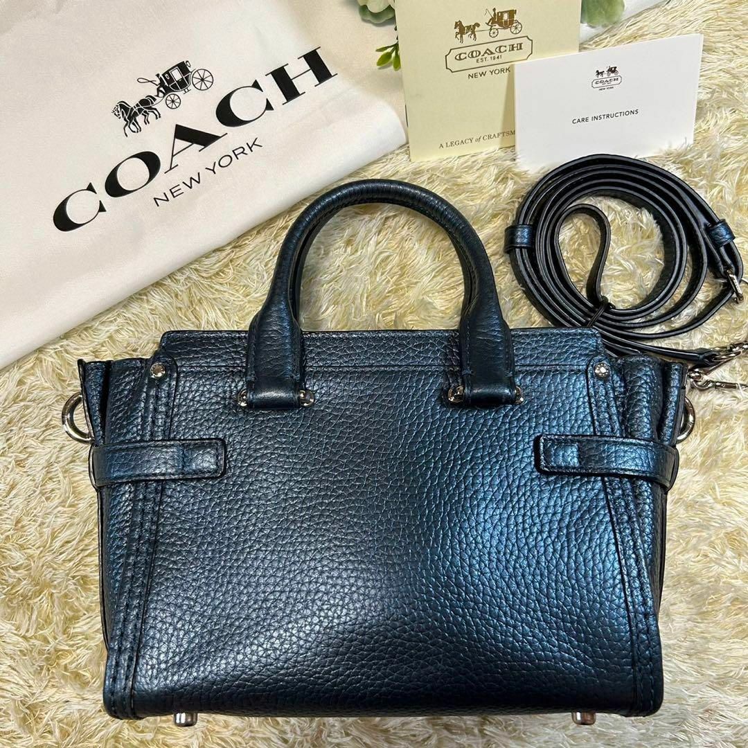 未使用　COACH　レザーリュック 　パンチング加工