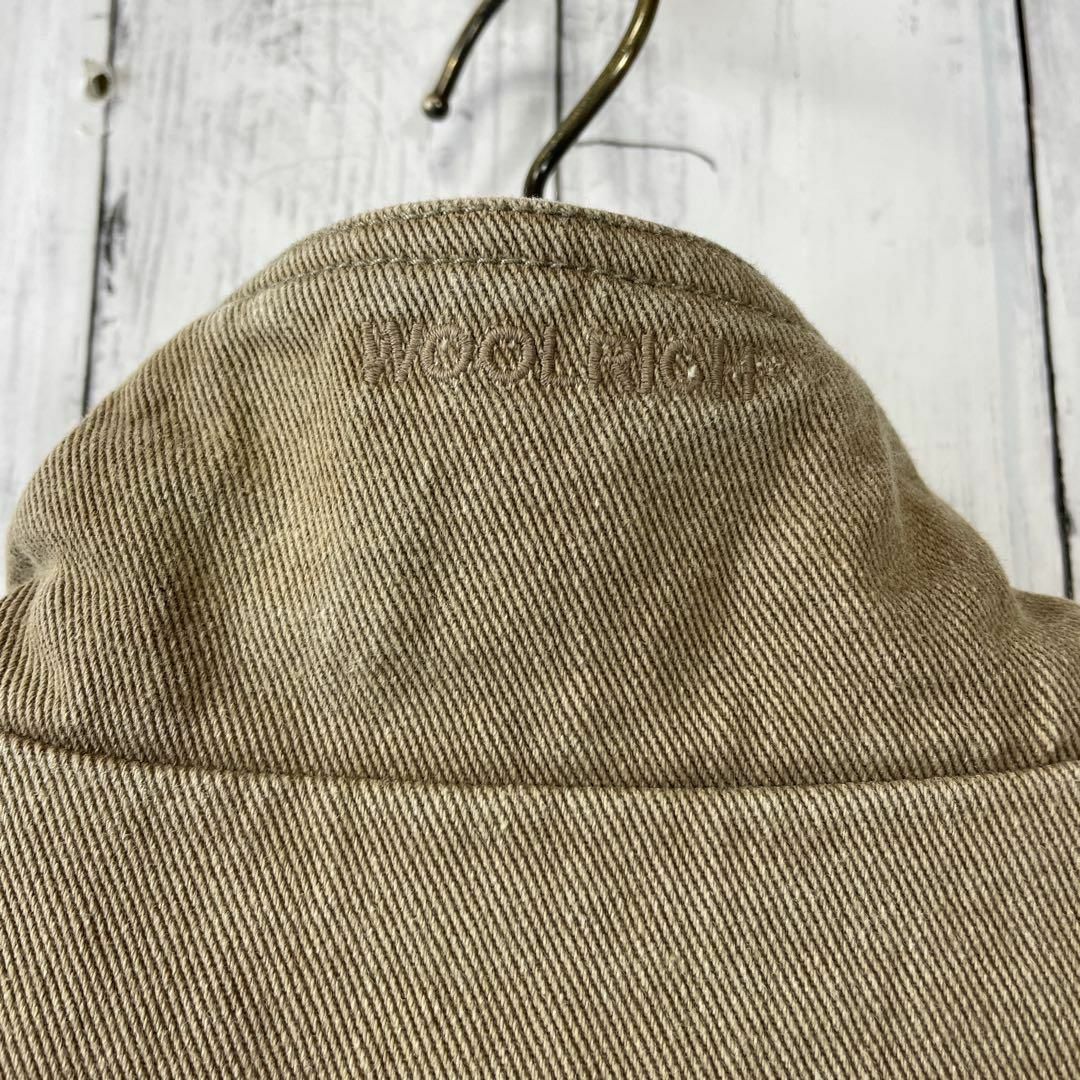 WOOLRICH(ウールリッチ)のウールリッチ　ダックベスト　裏地薄いボア　メンズサイズＬ　薄茶色ブラウン　古着 メンズのトップス(ベスト)の商品写真