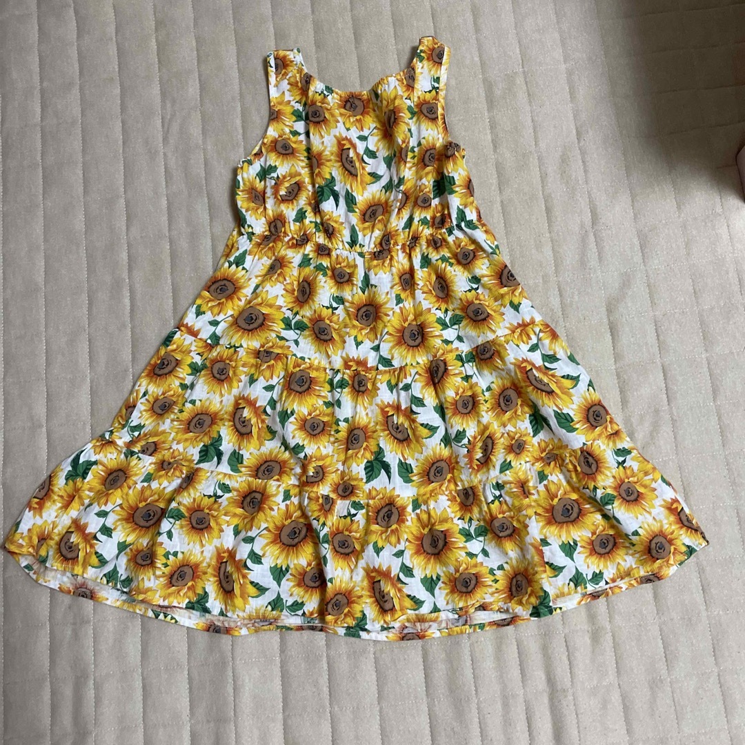 西松屋(ニシマツヤ)のひまわり柄🌻ワンピース　【中古】 キッズ/ベビー/マタニティのキッズ服女の子用(90cm~)(ワンピース)の商品写真