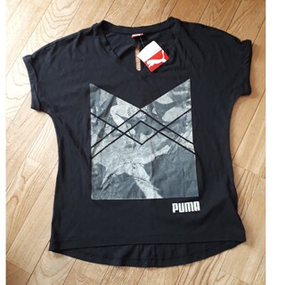 プーマ(PUMA)の【新品　プーマツイストTシャツ】(Tシャツ(半袖/袖なし))
