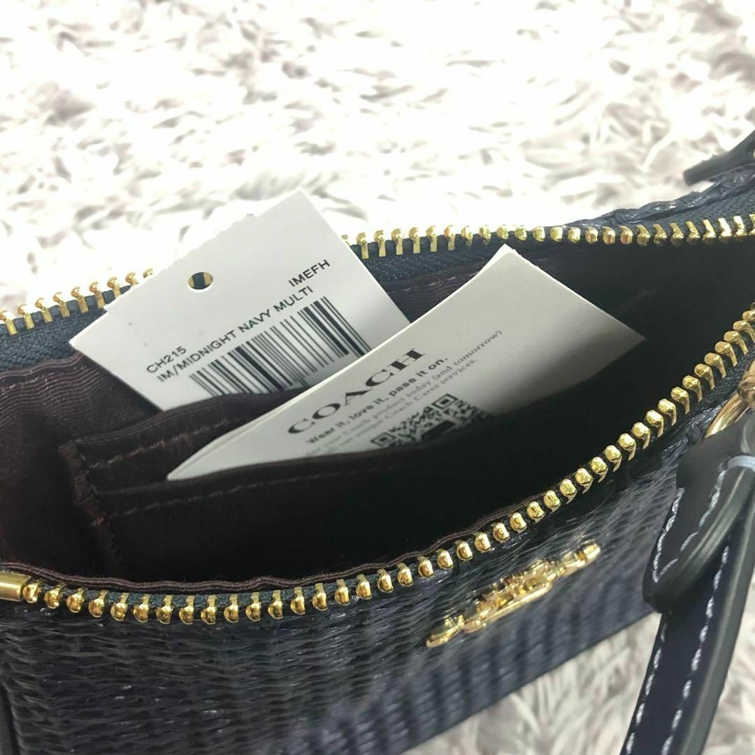 COACH(コーチ)の⭐COACH⭐コーチ⭐新品 ストローハンドバッグ タッセル ch215ネイビー レディースのバッグ(クラッチバッグ)の商品写真