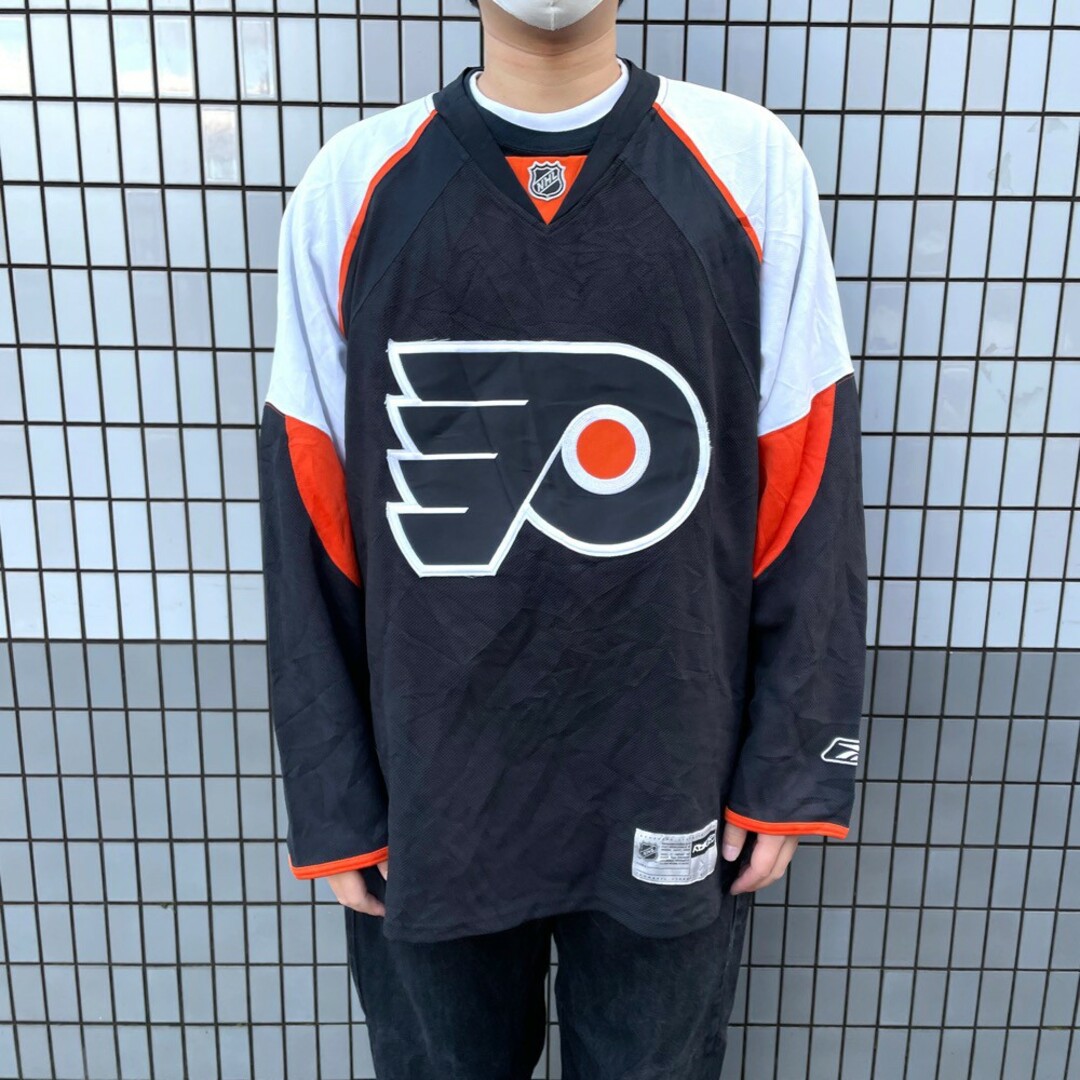 リーボック Reebok CCM NHL Philadelphia Flyers フィラデルフィア フライヤーズ メッシュ ホッケージャージ 長袖 ロゴ ワッペン 刺繍 サイズ：XL ブラック×ホワイト×オレンジ     mellow 【あす楽対応】【屋mellow店】