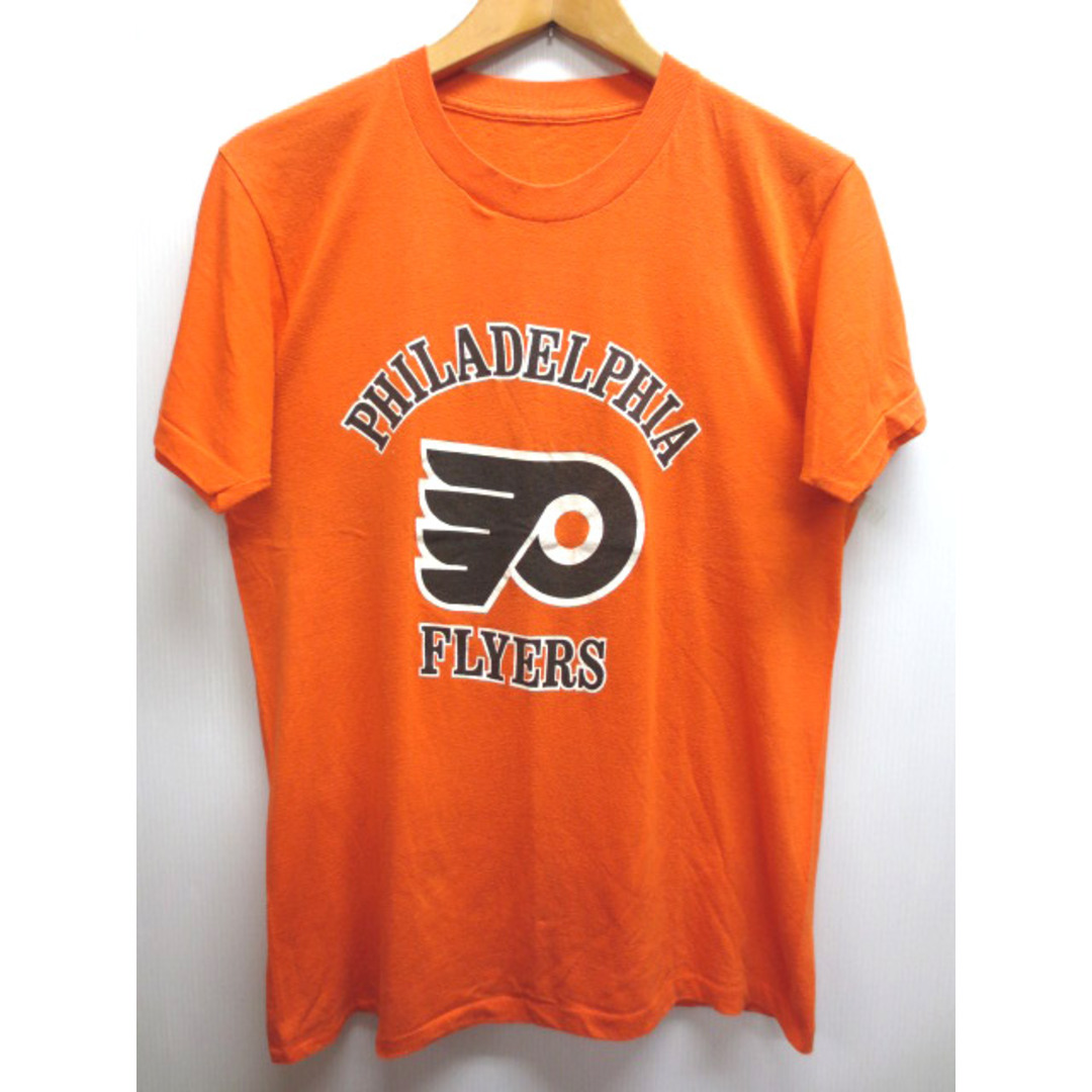 【中古】CCM NHL "Philadelphia Flyers"/フィラデルフィア・フライヤーズ 半袖 Tシャツ オレンジ×白 【サイズ：Men's S位】【アイスホッケー】【あす楽対応】【古着屋mellow楽天市場店】 スポーツ/アウトドアのスポーツ/アウトドア その他(アメリカンフットボール)の商品写真