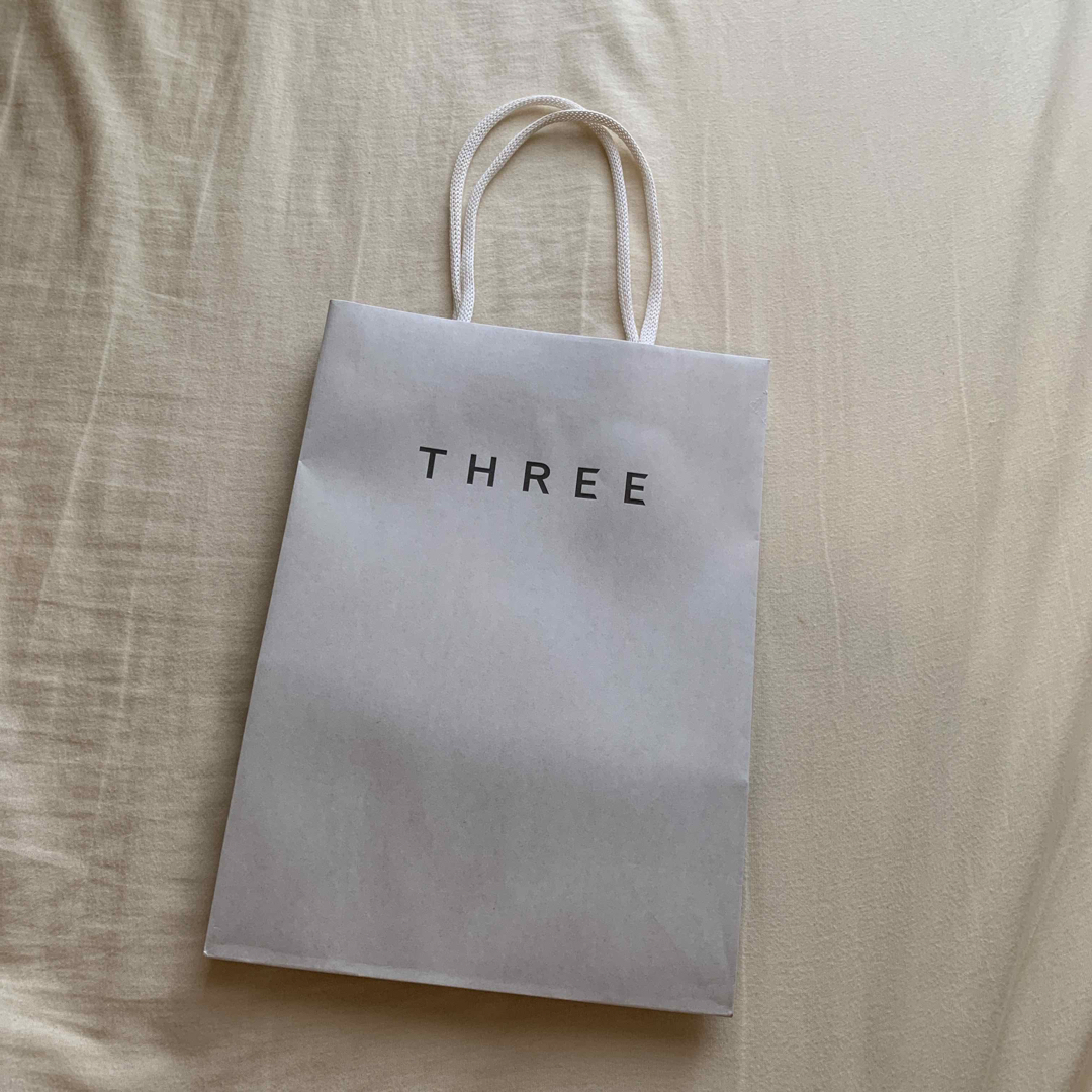 THREE(スリー)のThree 紙袋 レディースのバッグ(ショップ袋)の商品写真