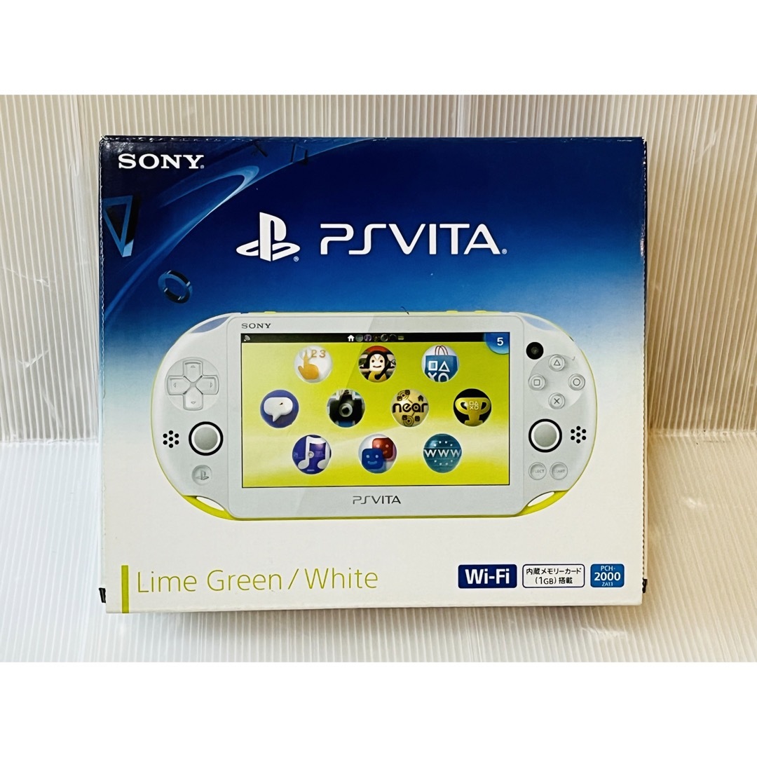 PlayStation Vita(プレイステーションヴィータ)の新品同様　ほぼ新品　PS Vita　ライムグリーン ホワイト　PCH-2000☆ エンタメ/ホビーのゲームソフト/ゲーム機本体(携帯用ゲーム機本体)の商品写真