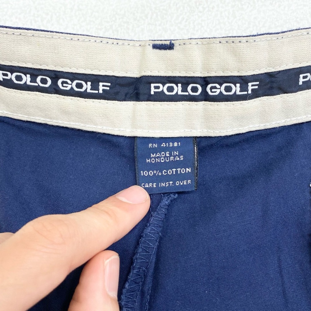 Ralph Lauren(ラルフローレン)の【中古】ポロ ゴルフ POLO GOLF チノパンツ ツータック エンブレム ワッペン サイズ：W33 L31.5 ネイビー メンズのスーツ(スラックス/スーツパンツ)の商品写真