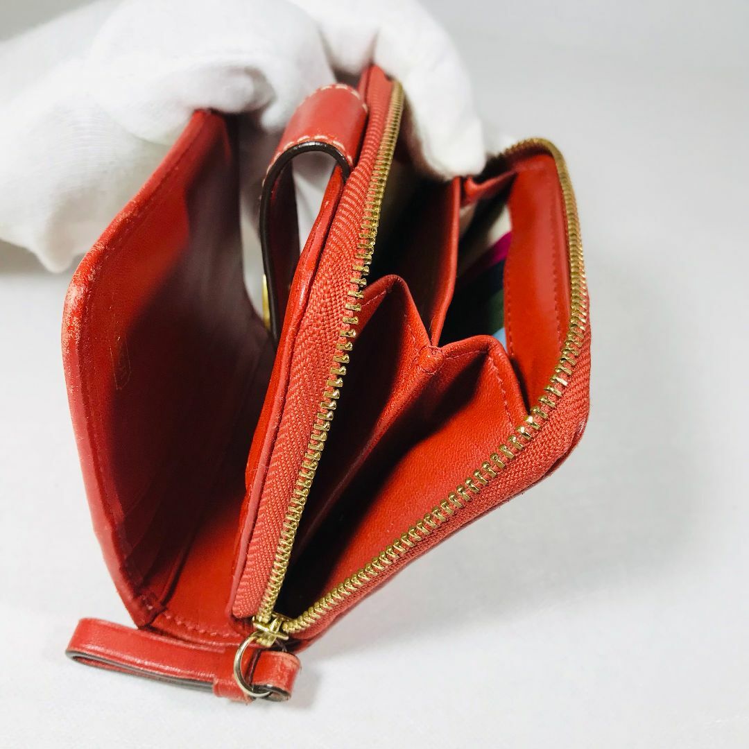 COACH(コーチ)のCOACHコーチ２つ折り財布　オレンジ系 レディースのファッション小物(財布)の商品写真
