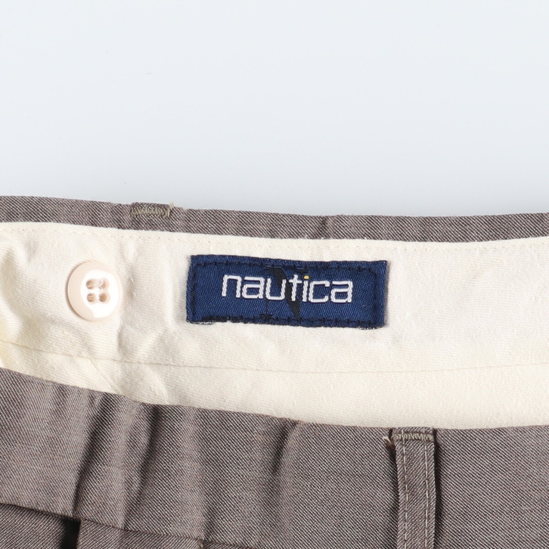 NAUTICA(ノーティカ)の古着 90年代 ノーティカ NAUTICA ツータック スラックスパンツ メンズw34 ヴィンテージ /eaa372963 メンズのパンツ(スラックス)の商品写真