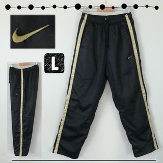 ナイキ(NIKE)のNIKE★ナイロントラックパンツ★スウッシュロゴ金刺&ゴールドサイドラインL(その他)