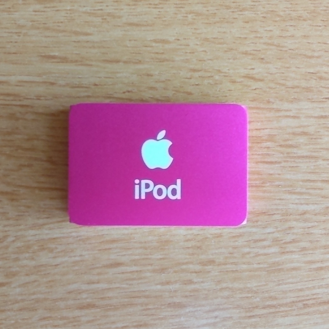Apple(アップル)のAppel　iPod shuffle　1GB　ピンク　ジャンク品 スマホ/家電/カメラのオーディオ機器(ポータブルプレーヤー)の商品写真