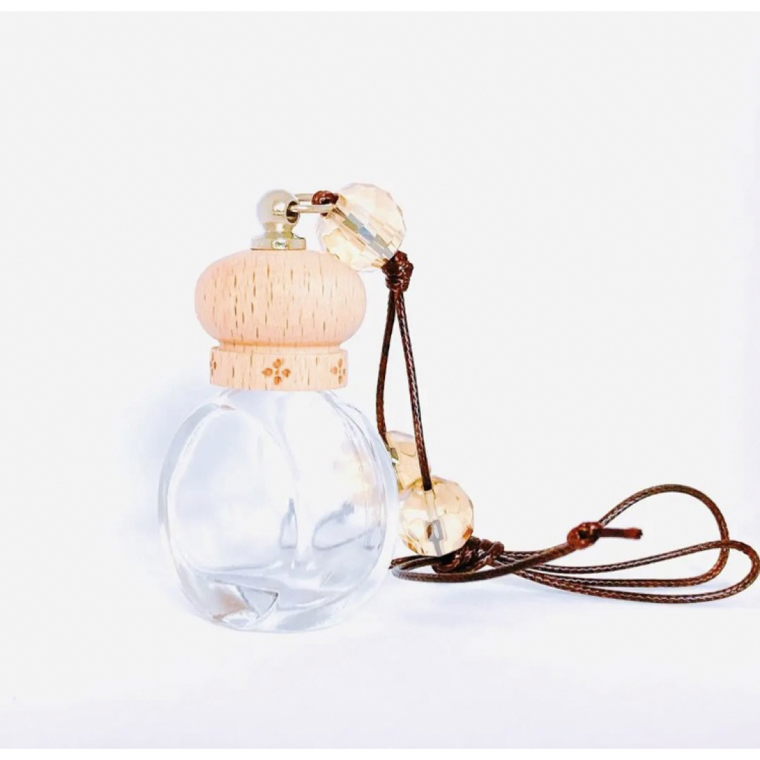 アロマ 車内 ディフューザー パープル 花 ガラス 芳香 紫 チャーム 香水瓶 コスメ/美容のリラクゼーション(アロマディフューザー)の商品写真