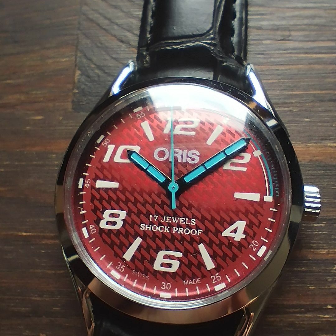 老舗ORIS レッドダイアル シルバーボディー腕時計 機械式手巻17石ST96