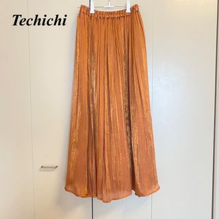 テチチ(Techichi)のTechichi シャイニープリーツ ロングスカート テラコッタ(ロングスカート)