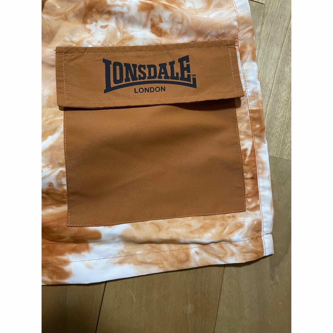 LONSDALE(ロンズデール)の【未使用品】LONSDALE タイダイ柄 ショートパンツ オレンジ Lサイズ メンズのパンツ(ショートパンツ)の商品写真