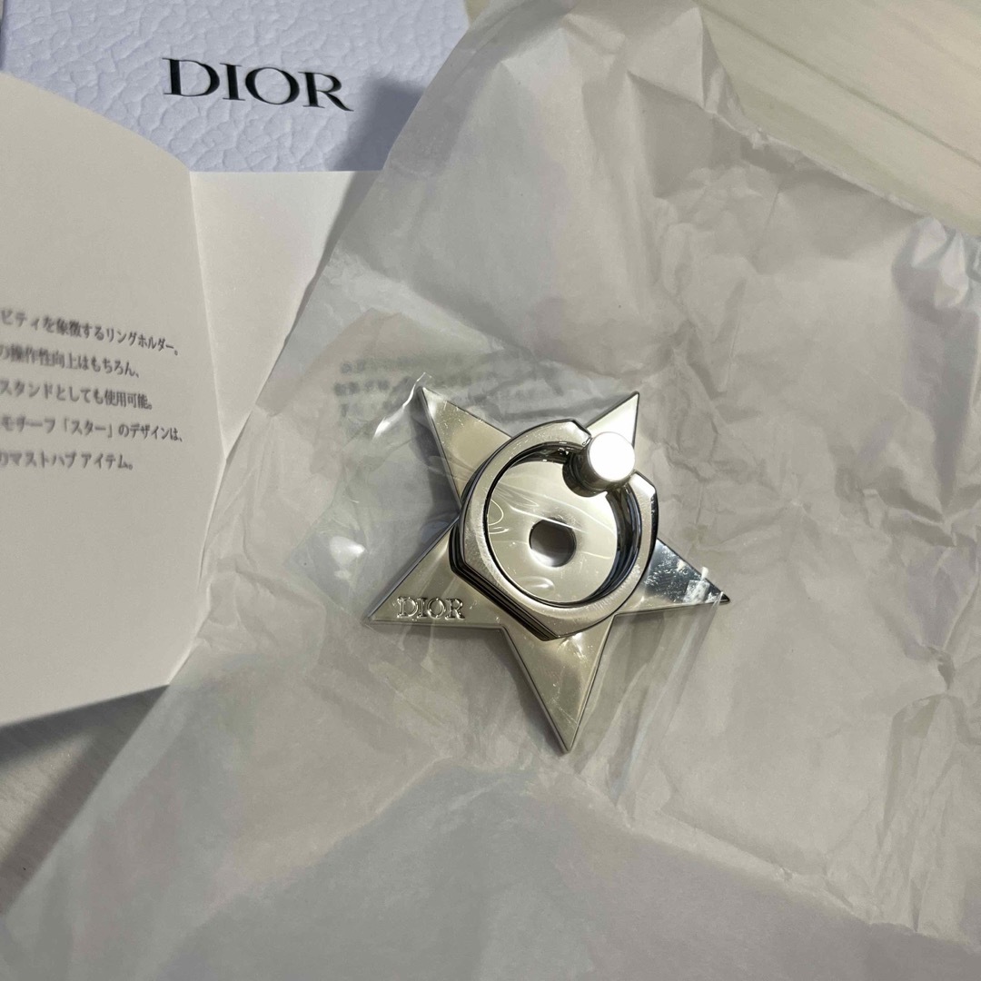 Dior(ディオール)のディオール スター シルバー スマホリング ノベルティ 非売品 新品未使用 スマホ/家電/カメラのスマホアクセサリー(その他)の商品写真