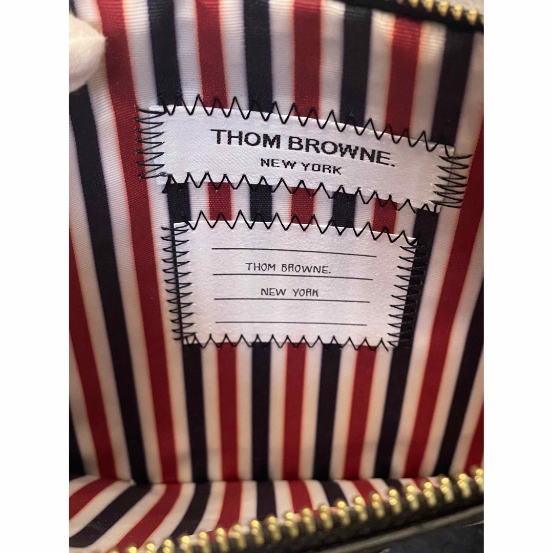 THOM BROWNE(トムブラウン)の新品未使用品　THOM BROWNE トムブラウン クラッチバッグ メンズのバッグ(セカンドバッグ/クラッチバッグ)の商品写真