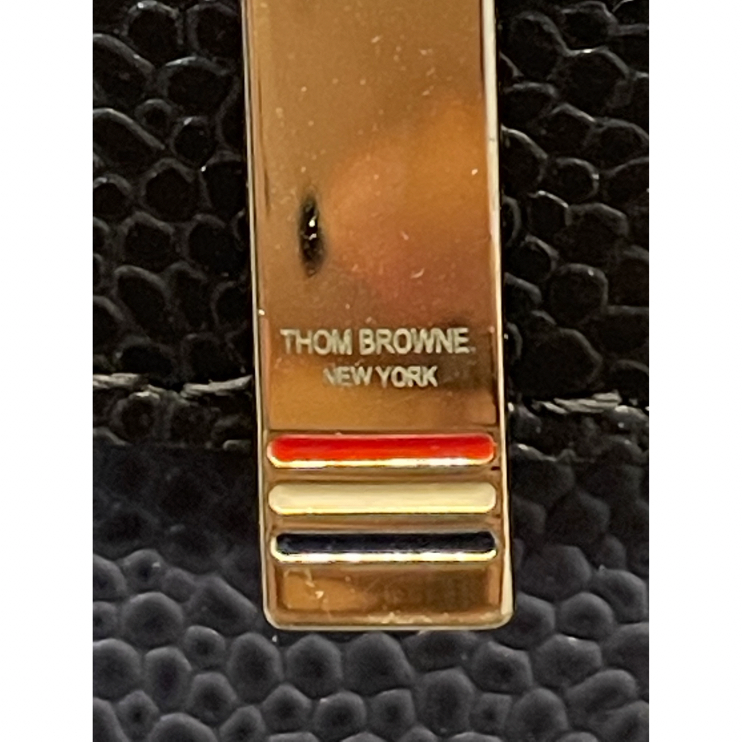 THOM BROWNE(トムブラウン)の新品未使用品　THOM BROWNE トムブラウン クラッチバッグ メンズのバッグ(セカンドバッグ/クラッチバッグ)の商品写真