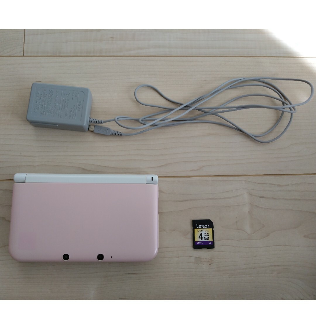 ニンテンドー3DS(ニンテンドー3DS)のニンテンドーNintendo 3DS LLピンク×ホワイト エンタメ/ホビーのゲームソフト/ゲーム機本体(携帯用ゲーム機本体)の商品写真