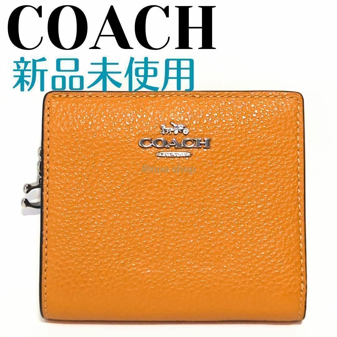COACH - ❤新品未使用❤COACH 二つ折り財布 オレンジの通販 by