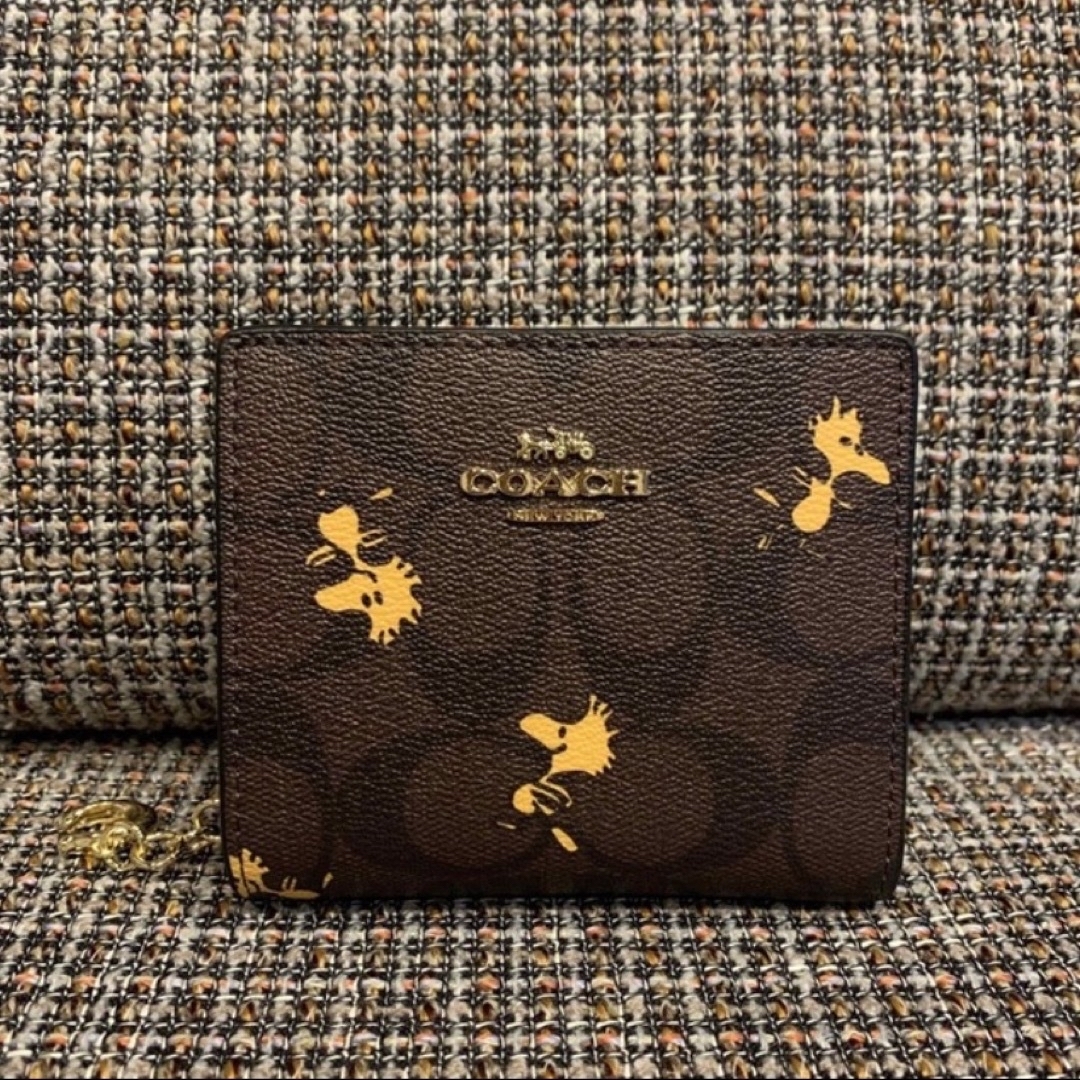 COACH コーチ　二つ折り財布　スヌーピー　　ウッドストック　ブラウン