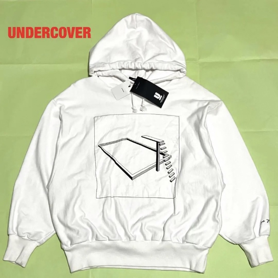 UNDERCOVER(アンダーカバー)の【新品】UNDERCOVER　アンダーカバー　パッチプリントドルマンフーディー メンズのトップス(パーカー)の商品写真