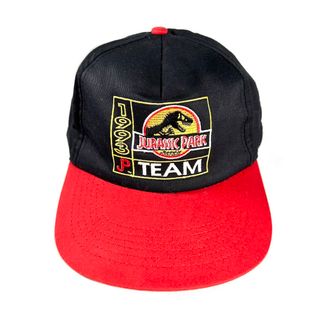 ユニバーサルエンターテインメント(UNIVERSAL ENTERTAINMENT)のJurassic Park Promotion cap black/red(キャップ)