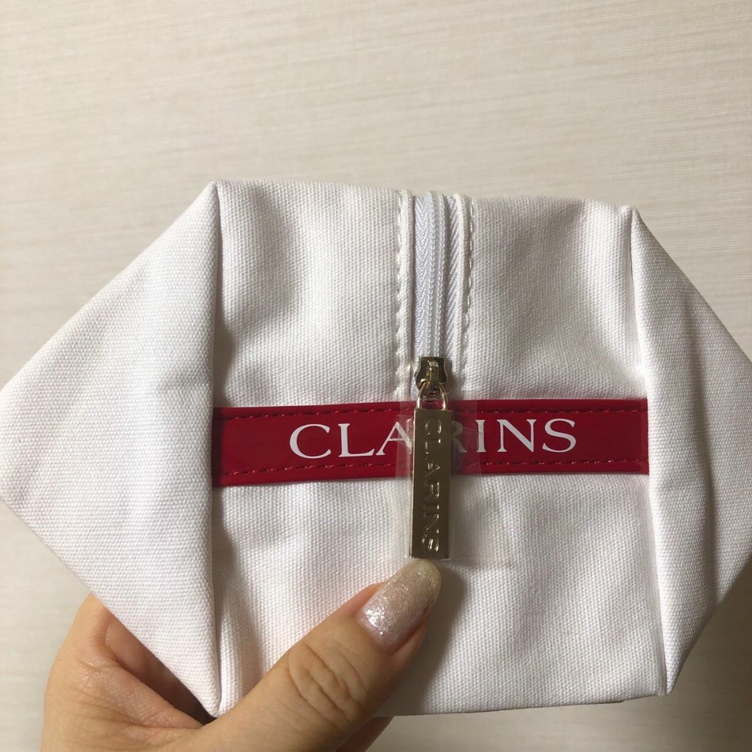 CLARINS(クラランス)のクラランス ミニポーチ 化粧ポーチ 小物入れ ロゴ 白 ホワイト レディースのファッション小物(ポーチ)の商品写真