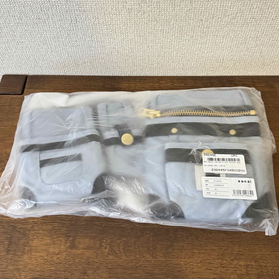 60サイズで発送します未使用 sacai Carhartt WIP Pocket Bag 水色 サカイ