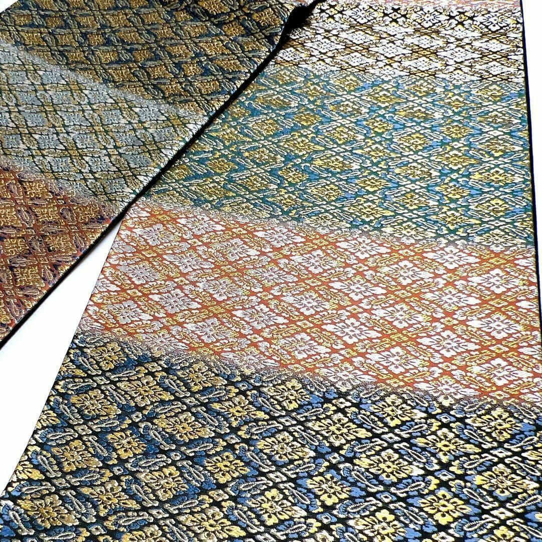 クリーム色地に二種の花菱柄が織られた袋帯　着物