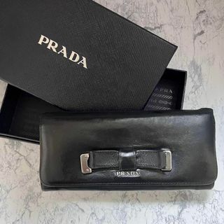 プラダ(PRADA)の★プラダ・PRADA ★長財布 リボン かぶせ蓋 ブラック シルバーロゴ(財布)