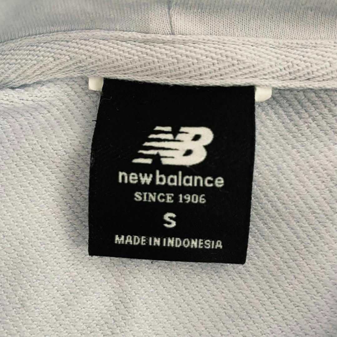 New Balance(ニューバランス)のニューバランス　パーカー　ホワイト　Mサイズ　白　アレディース　プルオーバー レディースのトップス(パーカー)の商品写真