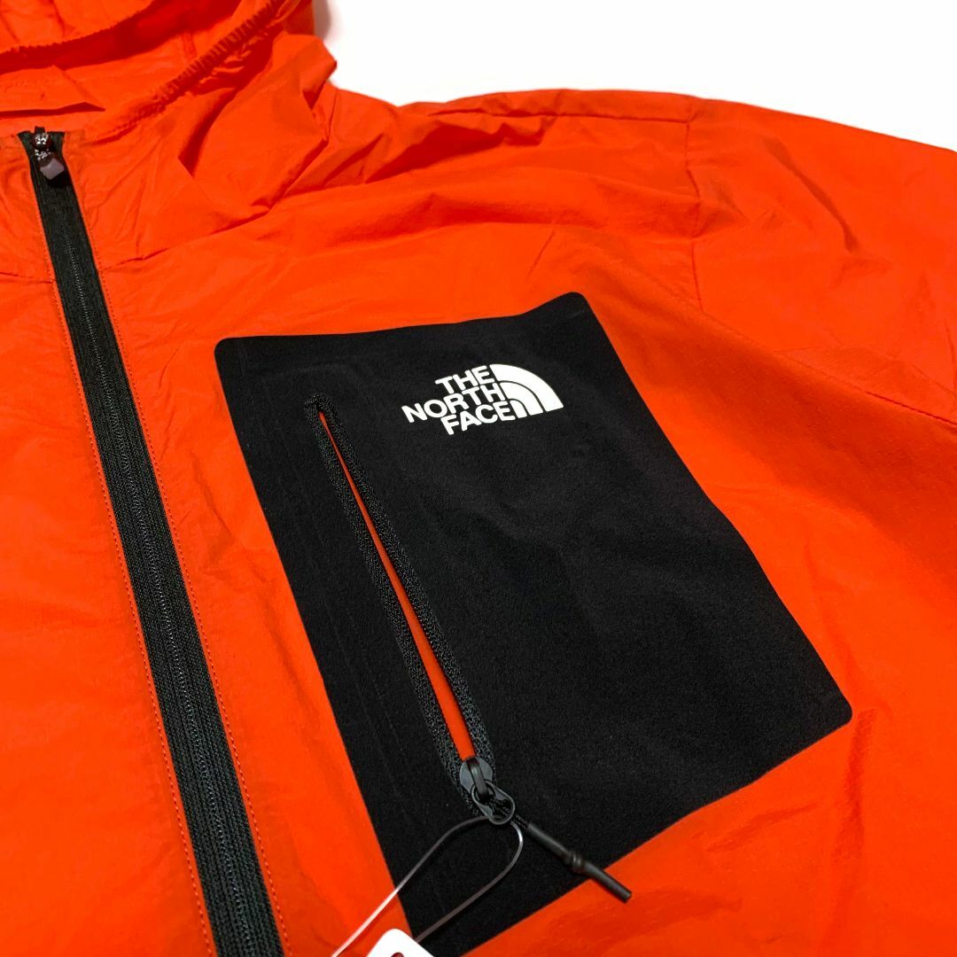 THE NORTH FACE(ザノースフェイス)の新品　Lサイズ　ノースフェイス　ビッグウォール ウインド ジャケット レッド　赤 メンズのジャケット/アウター(ナイロンジャケット)の商品写真