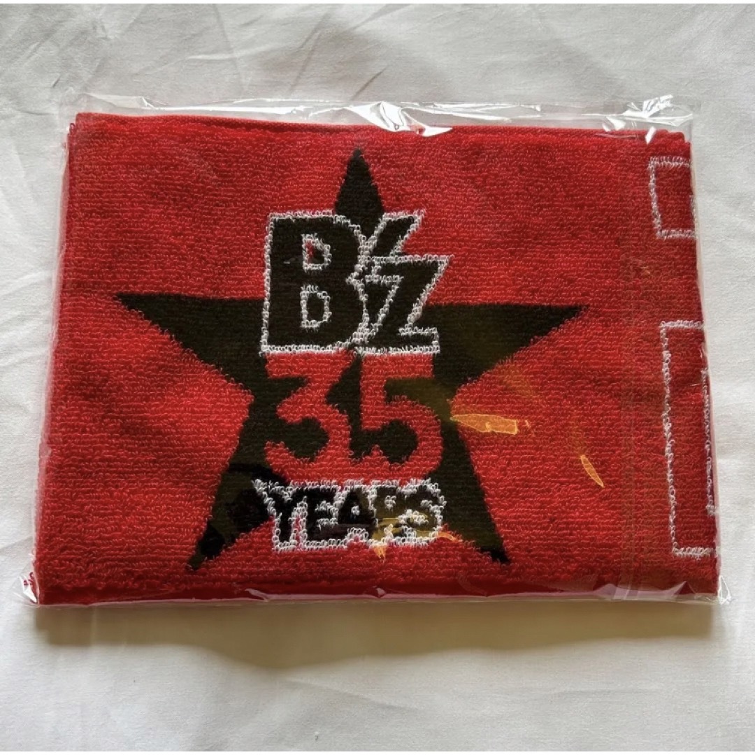 B'z(ビーズ)のB'z pleasure 2023 長居限定　タオル エンタメ/ホビーのタレントグッズ(ミュージシャン)の商品写真