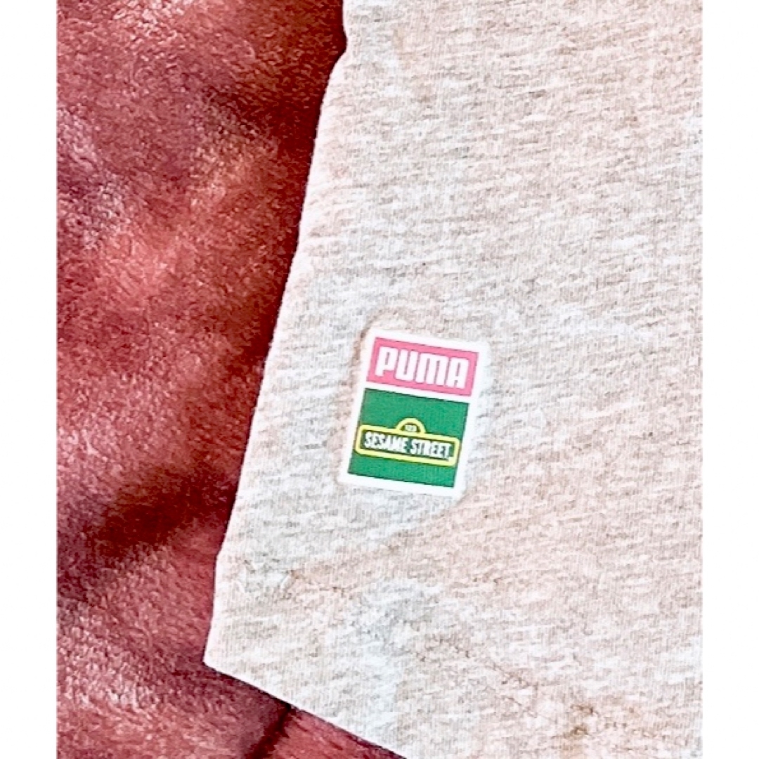 PUMA(プーマ)の美品　PUMA×セサミストリートTシャツ プーマ クッキーモンスター 110cm キッズ/ベビー/マタニティのキッズ服女の子用(90cm~)(Tシャツ/カットソー)の商品写真