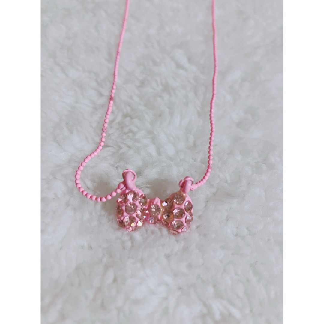 リボン ネックレス ピンク シルバー スワロフスキー ビジュー 可愛い レディースのアクセサリー(ネックレス)の商品写真
