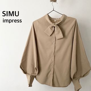 インプレス(Impress)のSIMU impress ベージュ　ボウタイ　バルーン袖　長袖　シャツ　トップス(シャツ/ブラウス(長袖/七分))