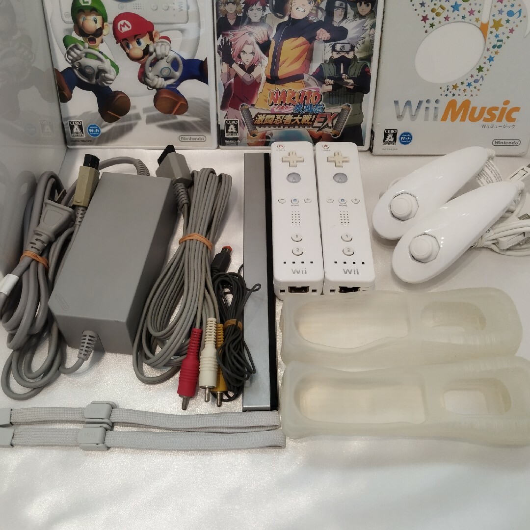 Wii - （実動、送料込み）wii 本体 リモコン ヌンチャク ソフト3本の ...