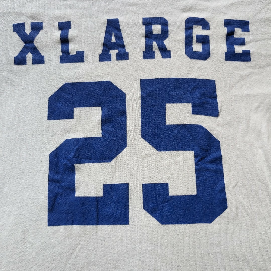XLARGE(エクストララージ)のX-LARGE　チャンピオン　コラボ　7分袖　Tシャツ　Mサイズ 白色　青色 メンズのトップス(Tシャツ/カットソー(七分/長袖))の商品写真