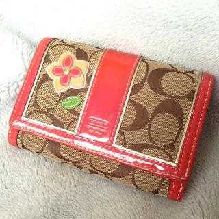 コーチ(COACH)のコーチ シグネチャー 折財布 ピンク(財布)