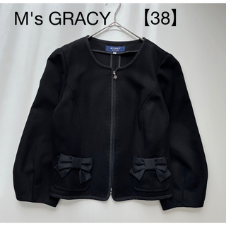 エムズグレイシー(M'S GRACY)のM's GRACYエムズグレイシーノーカラーリボンジャケット　黒　ブラック　38(ノーカラージャケット)