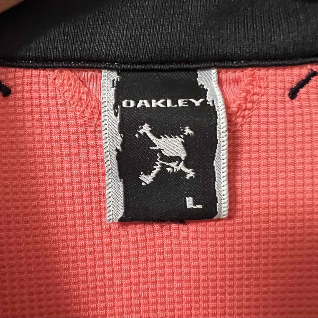 Oakley(オークリー)のOAKLEY オークリー　メンズゴルフウエア　Lサイズ　薄ピンク色 スポーツ/アウトドアのゴルフ(ウエア)の商品写真