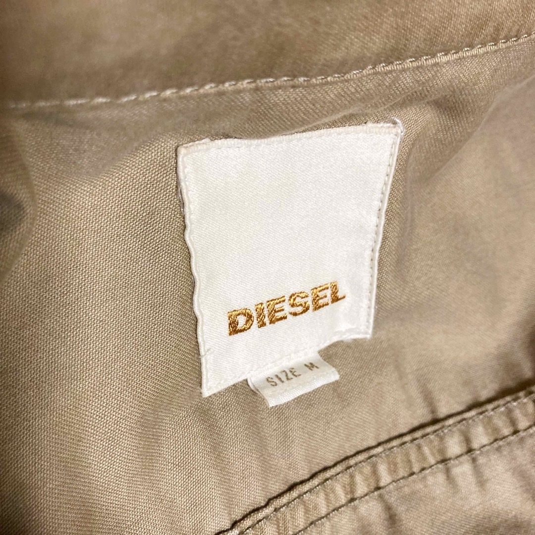 DIESEL(ディーゼル)の【匿名配送】DIESEL トレンチコート　ワンピース　プリーツ レディースのジャケット/アウター(トレンチコート)の商品写真