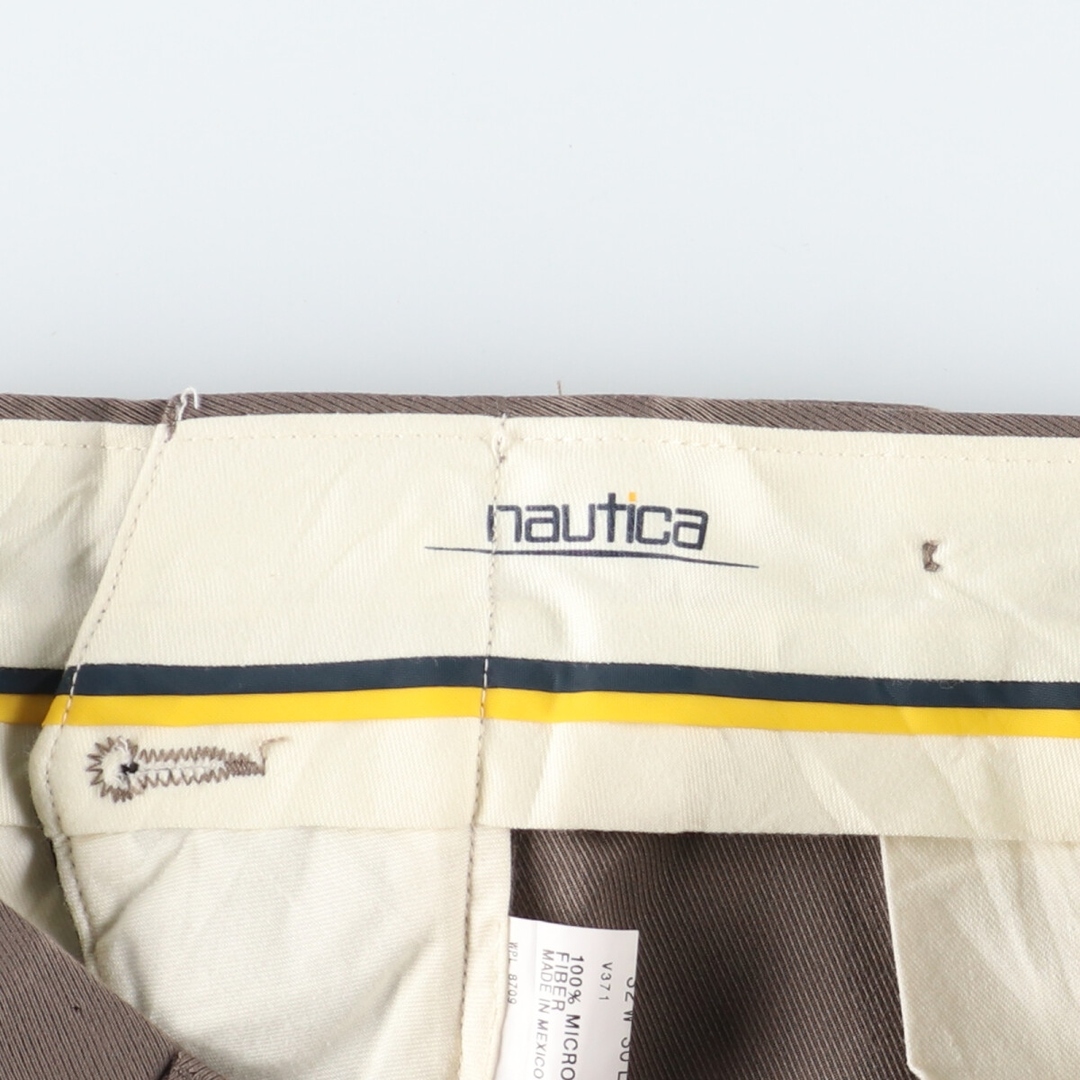 NAUTICA(ノーティカ)の古着 ノーティカ NAUTICA ツータック スラックスパンツ メンズw32 /eaa372015 メンズのパンツ(スラックス)の商品写真